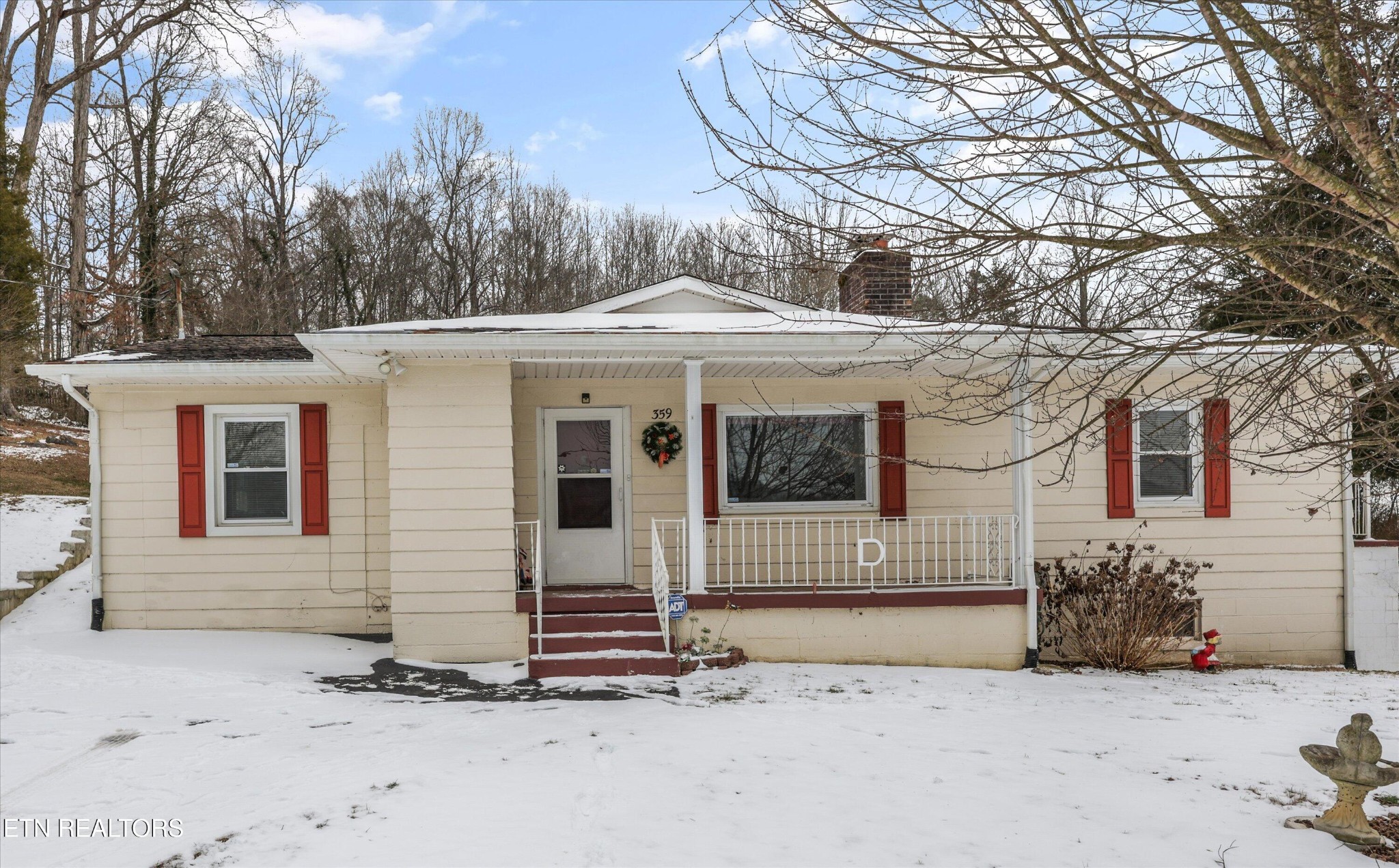 359 East Wolf Valley Road Heiskell, TN 37754 - Photo 1 of 40 a front view of a house with a yard