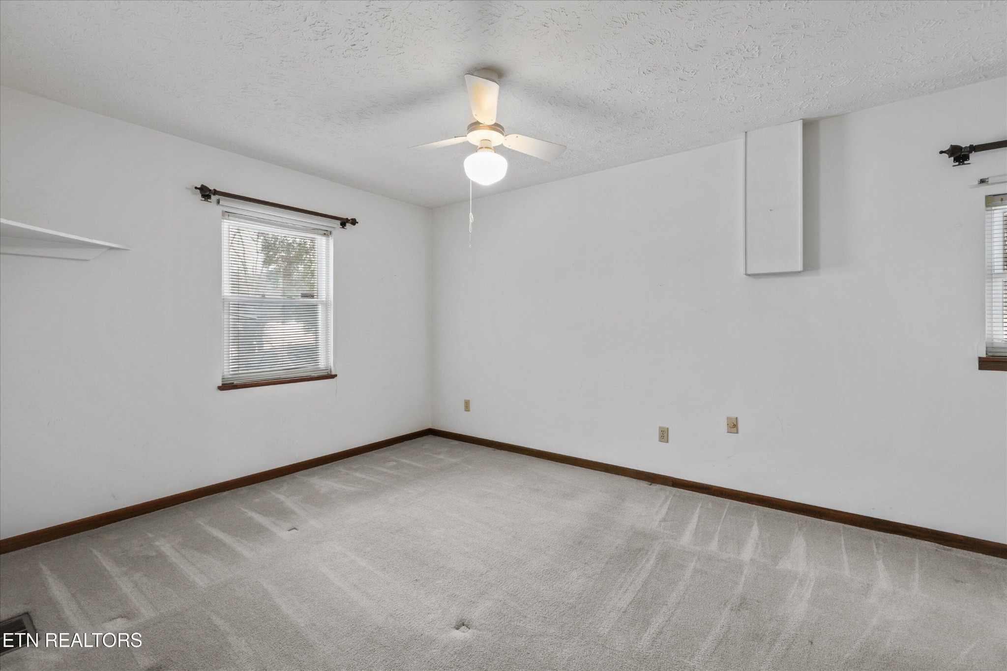 359 East Wolf Valley Road Heiskell, TN 37754 - Photo 13 of 40 a view of an empty room with a window