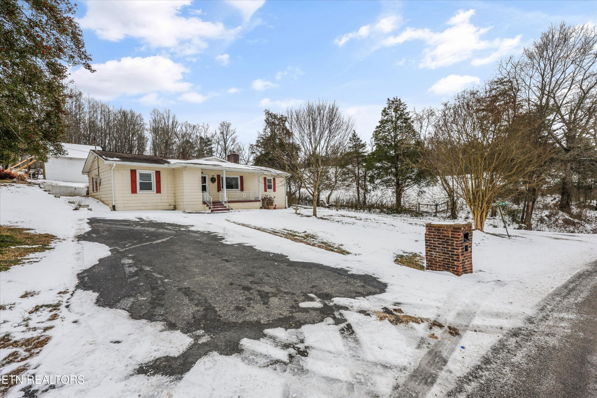 359 East Wolf Valley Road Heiskell, TN 37754 - Photo 29 of 40 a view of a road with snow on the road