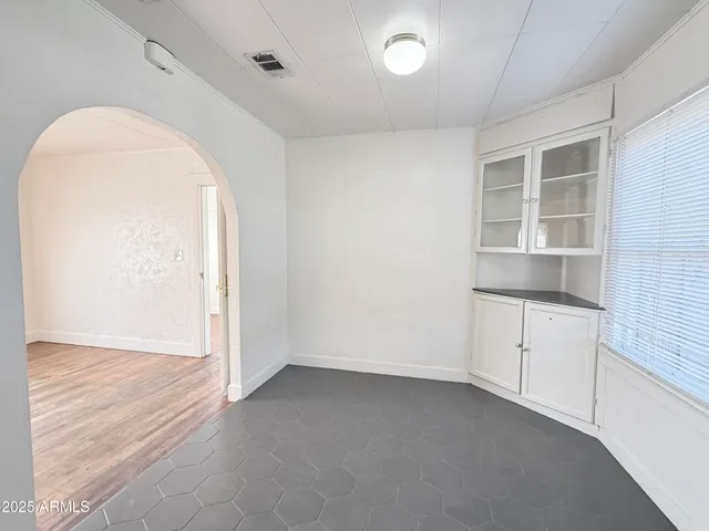 an empty room with windows