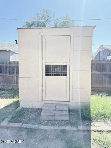 a view of entrance gate of a house