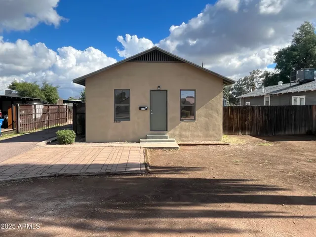 a house view with a outdoor space
