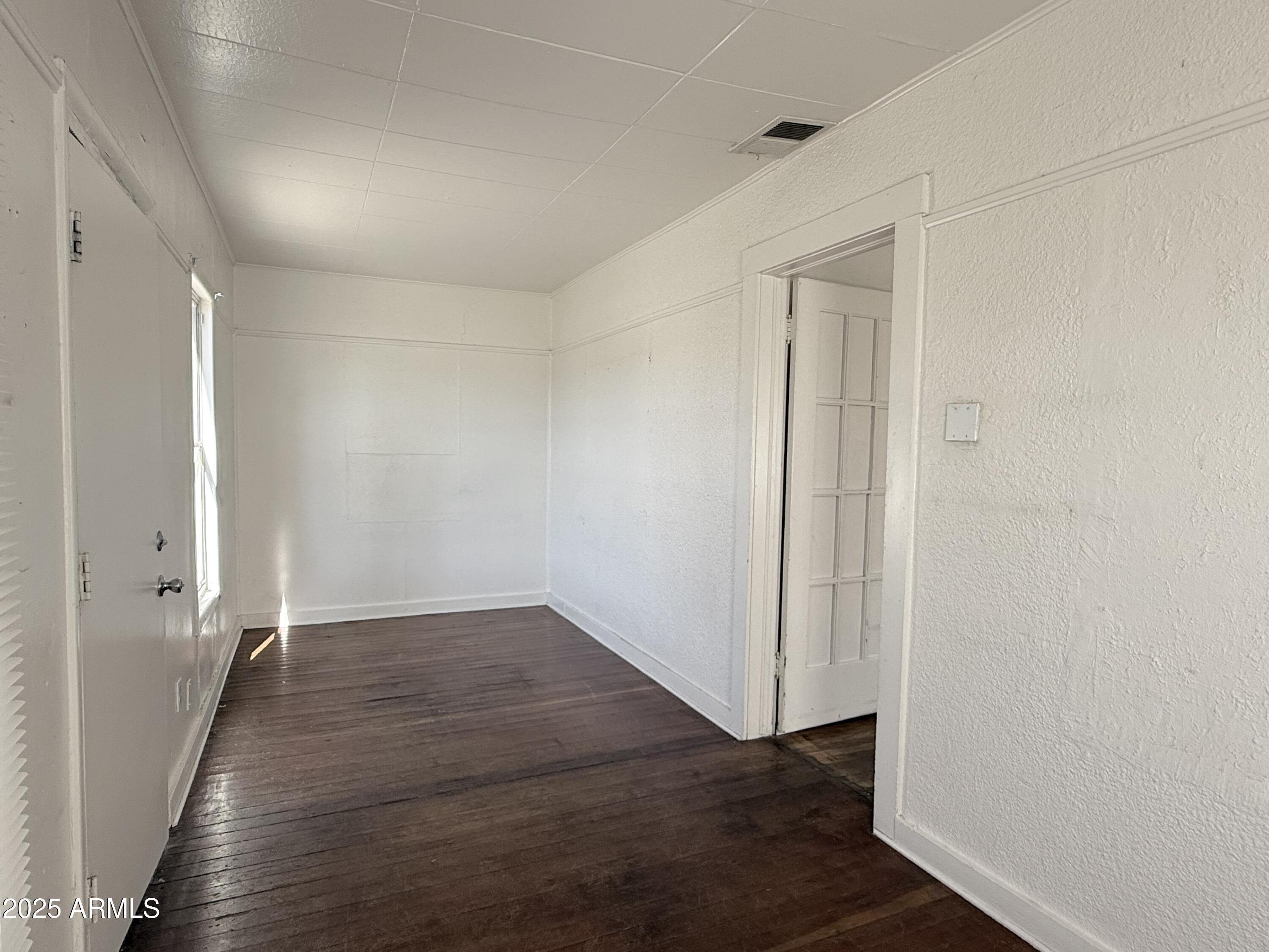 3809 North 9th Place Phoenix, AZ 85014 - Photo 4 of 28 wooden floor in an empty room