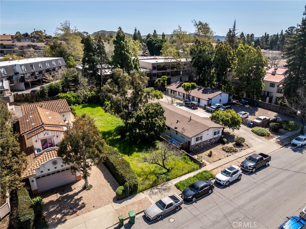 879 Walnut Street San Luis Obispo, CA 93401 - Photo 2 of 13 an aerial view of a house with a garden and lake view