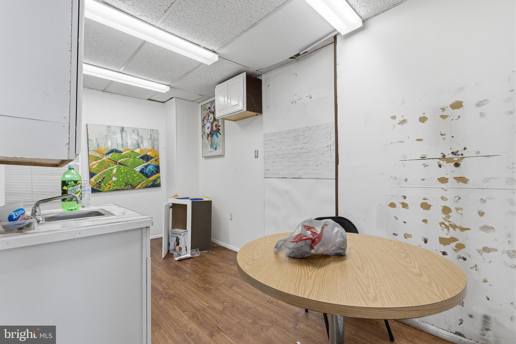 212 West Main Street Elkton, MD 21921 - Photo 27 of 35 a dining room with furniture and wooden floor