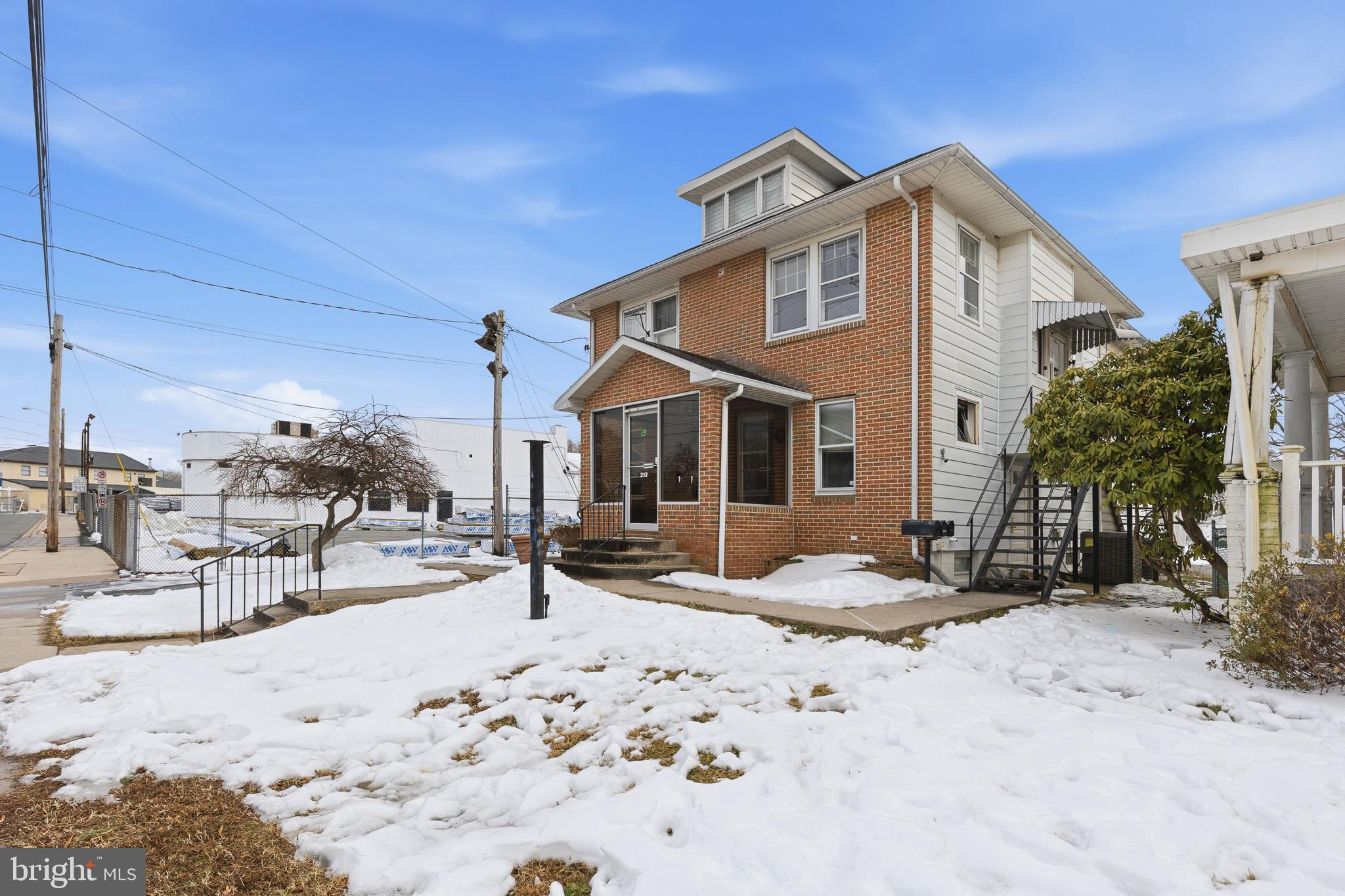 212 West Main Street Elkton, MD 21921 - Photo 33 of 35 a view of a house with a yard