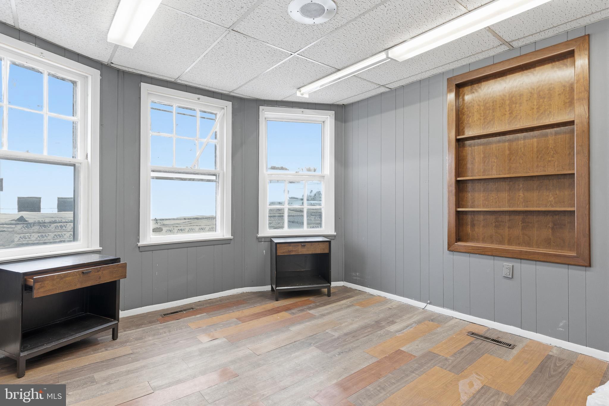 212 West Main Street Elkton, MD 21921 - Photo 6 of 35 a bedroom with a bed and a window