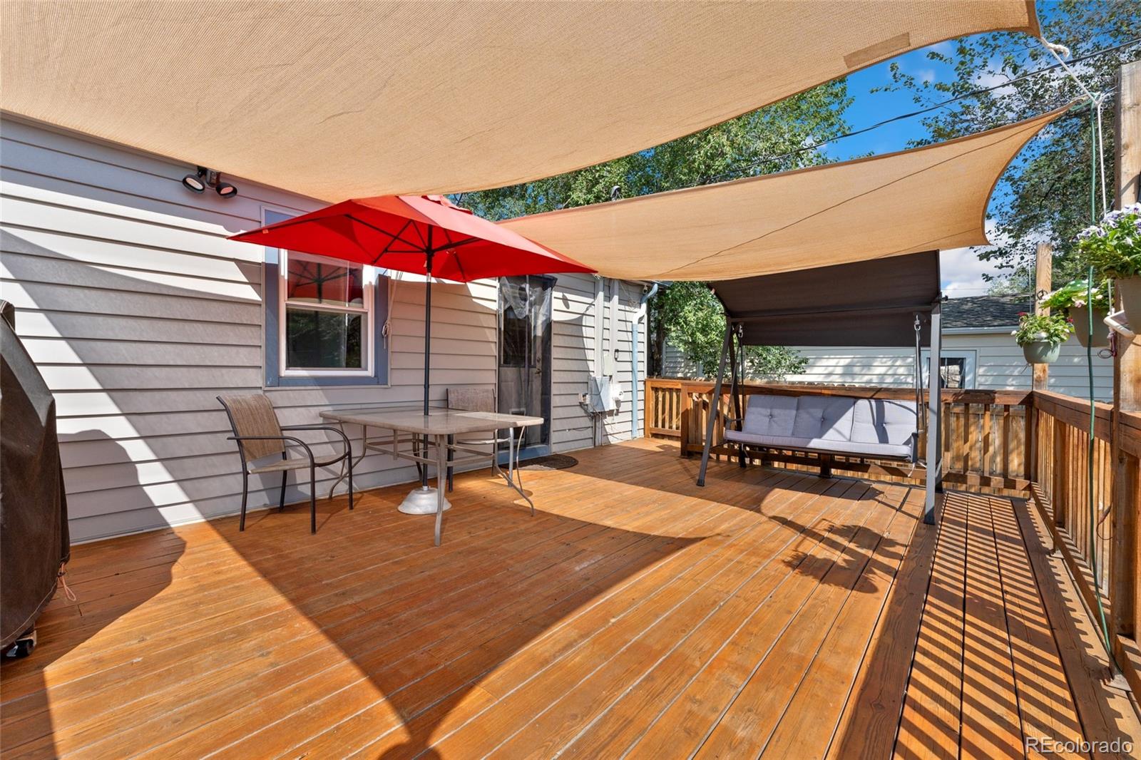 1530 Simms Street Lakewood, CO 80215 - Photo 26 of 38 a backyard of a house with seating space