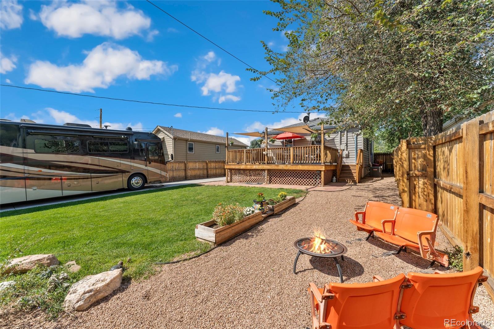 1530 Simms Street Lakewood, CO 80215 - Photo 28 of 38 a view of a backyard with sitting area