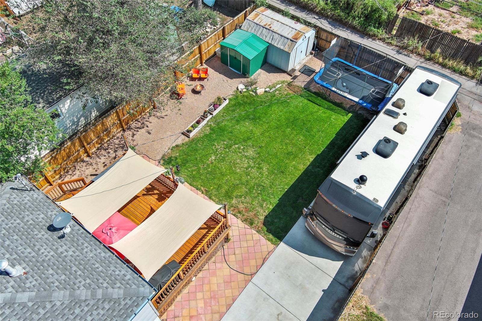 1530 Simms Street Lakewood, CO 80215 - Photo 31 of 38 an aerial view of a house with a yard
