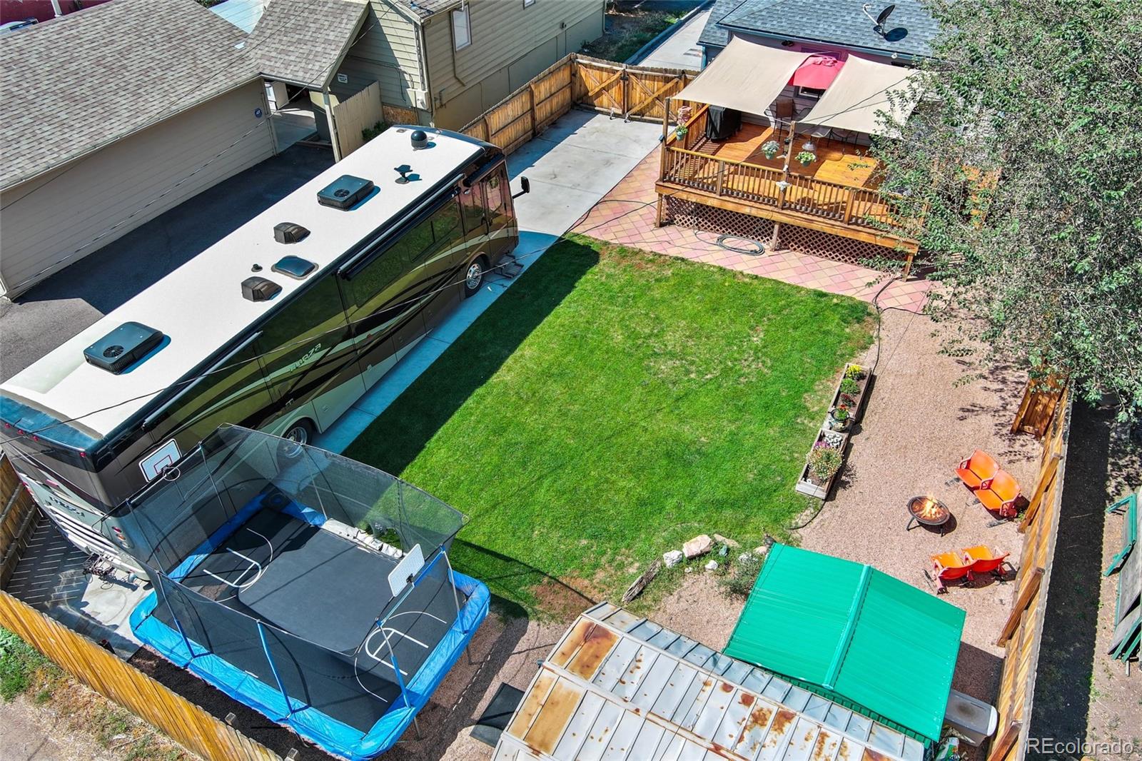 1530 Simms Street Lakewood, CO 80215 - Photo 32 of 38 an aerial view of a house with a garden