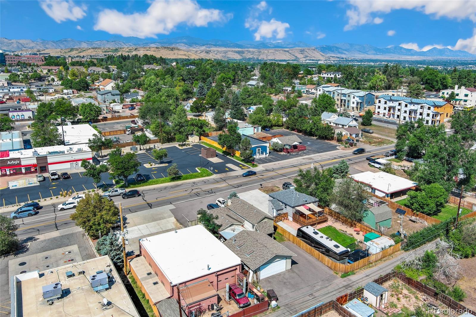 1530 Simms Street Lakewood, CO 80215 - Photo 34 of 38 an aerial view of a houses with a city view