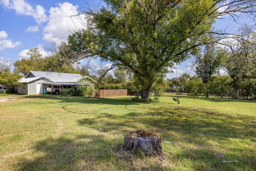 625 South Lillian Stephenville, TX 76401 - Photo 11 of 34 a view of a house with a yard
