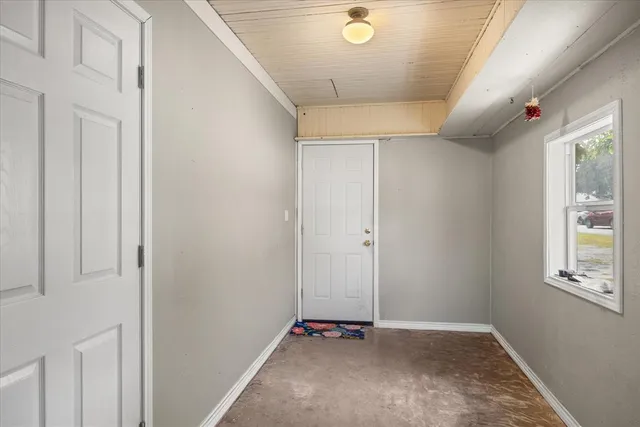 a kitchen with stainless steel appliances granite countertop a refrigerator sink and stove