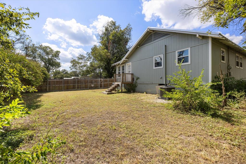 625 South Lillian Stephenville, TX 76401 - Photo 31 of 34 a view of backyard of house with trees