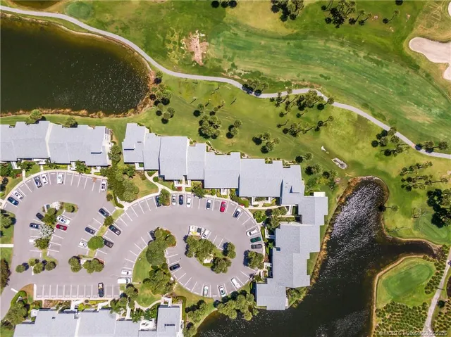 an aerial view of a houses with outdoor space