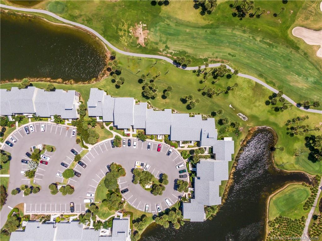 an aerial view of a houses with outdoor space