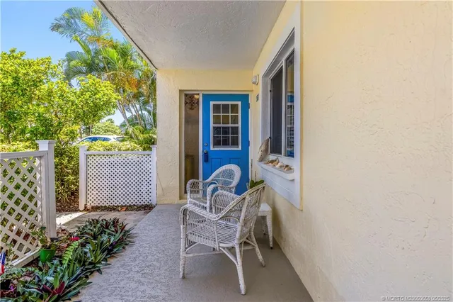 a chair and table in a backyard