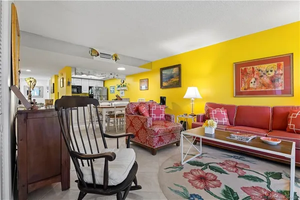 a living room with furniture and a couch