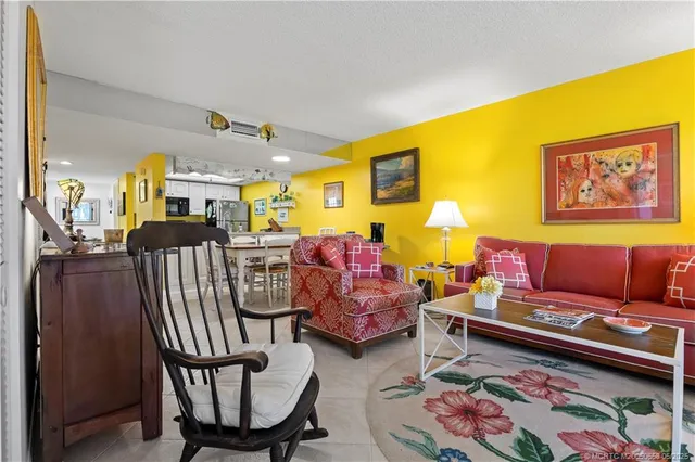 a living room with furniture and a couch