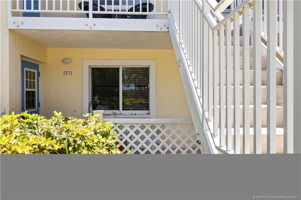 5571 Northeast Gulfstream Way Stuart, FL 34996 - Photo 32 of 40 a view of a door front of house