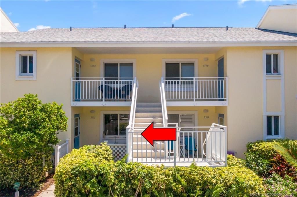 5571 Northeast Gulfstream Way Stuart, FL 34996 - Photo 7 of 40 a view of a bedroom with a small deck