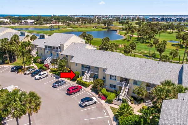 an aerial view of a house with outdoor space