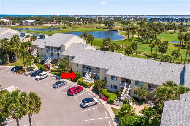 an aerial view of a house with outdoor space