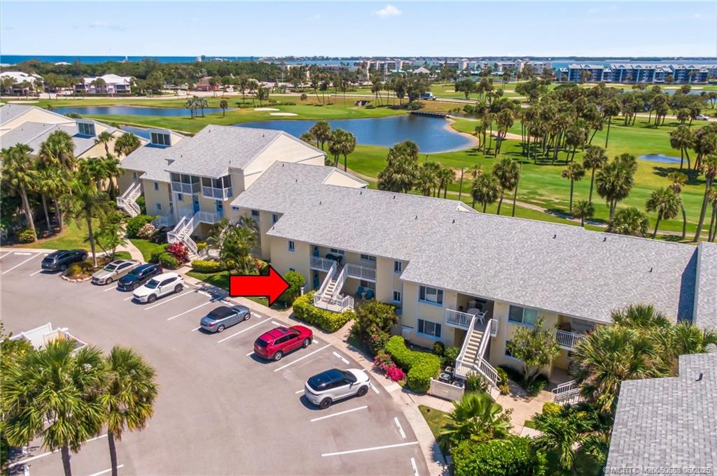 5571 Northeast Gulfstream Way Stuart, FL 34996 - Photo 9 of 40 an aerial view of a house with outdoor space