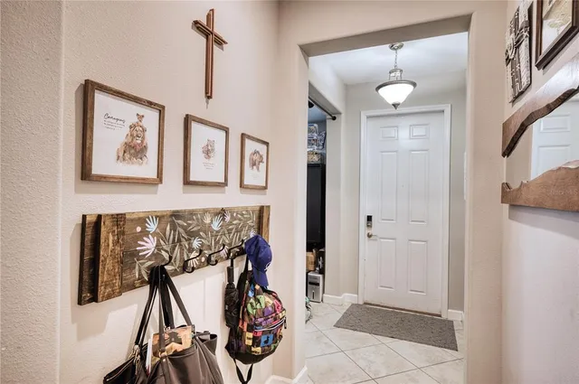 a view of an entryway with wooden floor