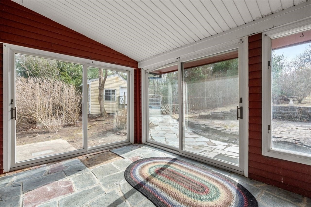 422 Liberty Square Road Boxborough, MA 01719 - Photo 23 of 39 a room with a bed and a large window