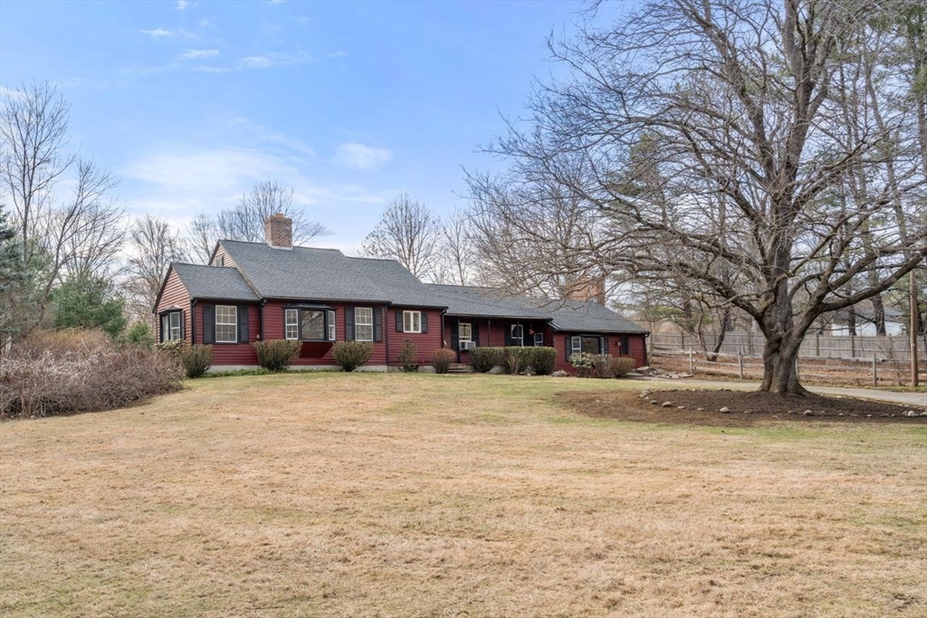 422 Liberty Square Road Boxborough, MA 01719 - Photo 34 of 39 a front view of a house with a yard