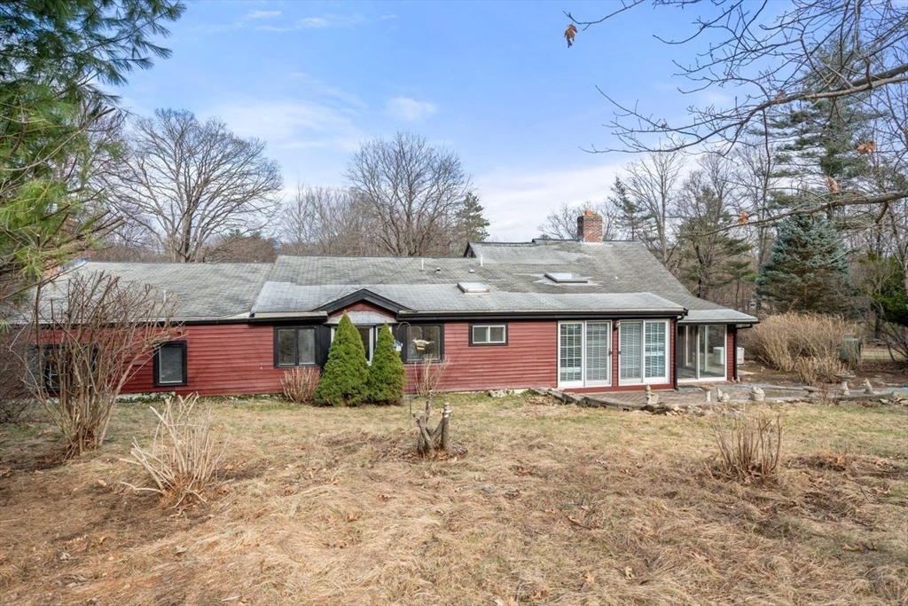 422 Liberty Square Road Boxborough, MA 01719 - Photo 38 of 39 front view of a house with a yard