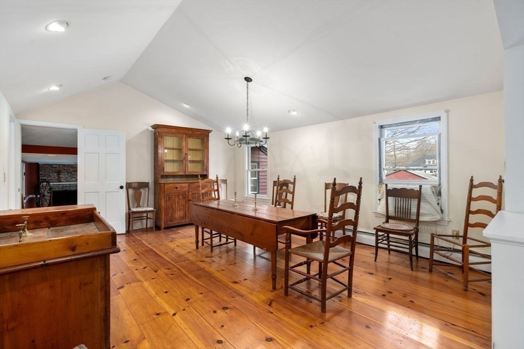 422 Liberty Square Road Boxborough, MA 01719 - Photo 4 of 39 a view of a dining room with furniture window and wooden floor