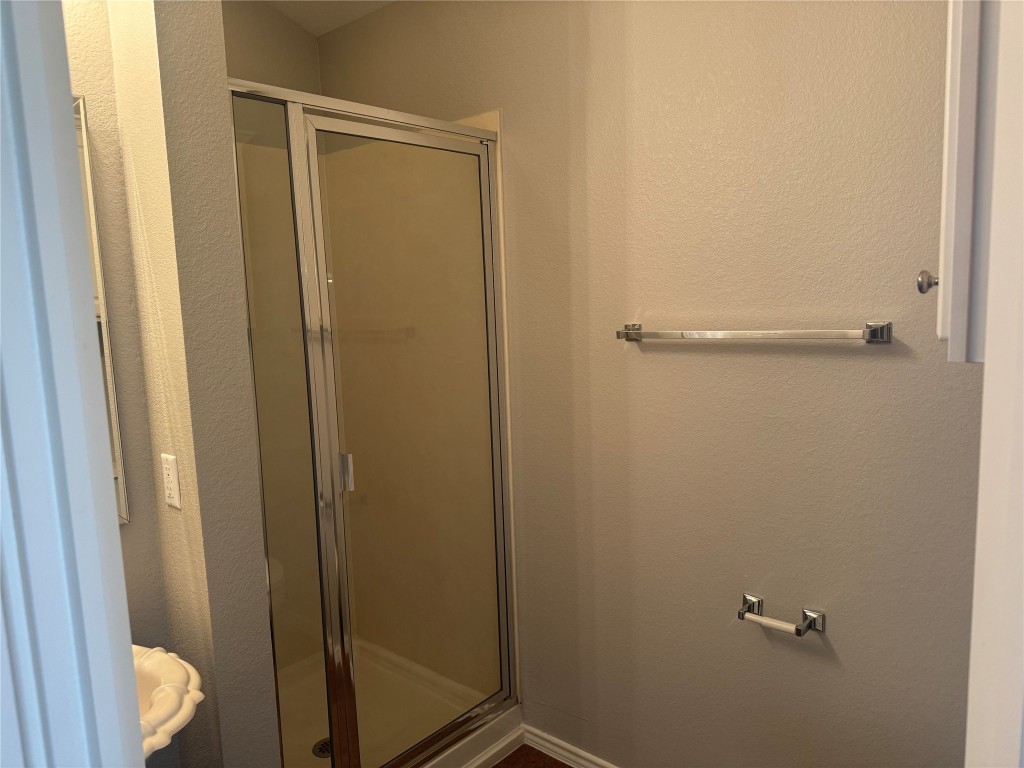 1900 Scofield Ridge Parkway, Unit 3401 Austin, TX 78727 - Photo 33 of 37 a bathroom with a shower