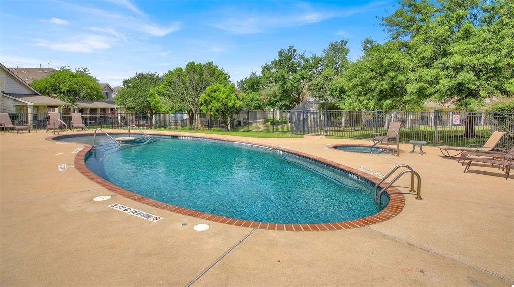 1900 Scofield Ridge Parkway, Unit 3401 Austin, TX 78727 - Photo 36 of 37 a view of a swimming pool with lounge chair