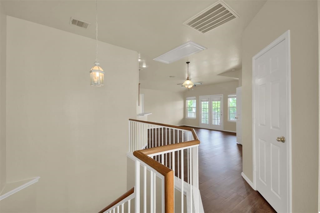 1900 Scofield Ridge Parkway, Unit 3401 Austin, TX 78727 - Photo 6 of 37 a view of entryway with wooden floor