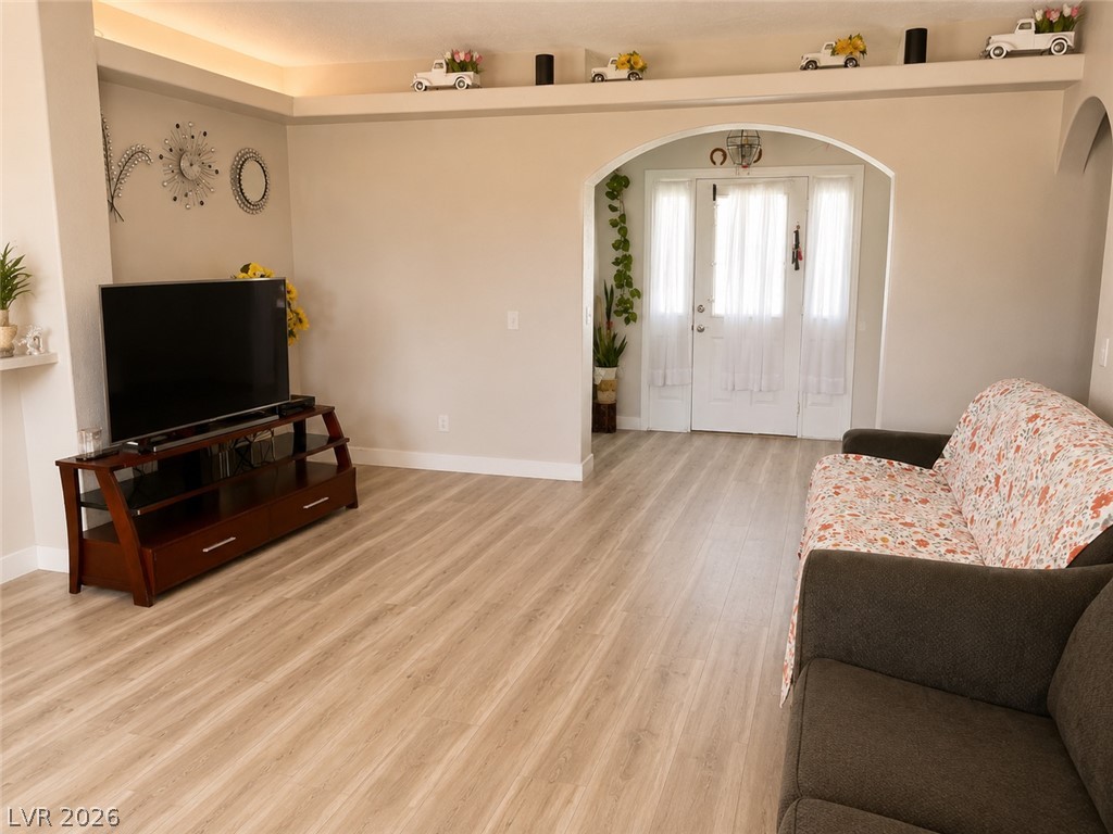 200 East Gamebird Road Pahrump, NV 89048 - Photo 4 of 23 Clean lines and a spacious layout define this inviting living area, perfect for relaxation.