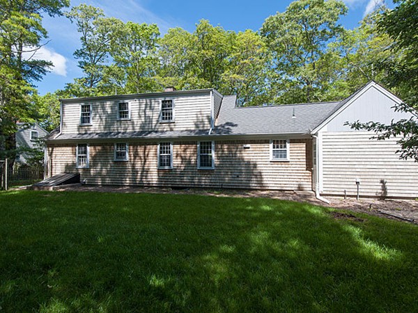 95 Holly Hill Road Barnstable, MA 02632 - Photo 4 of 16 a view of a house with a yard