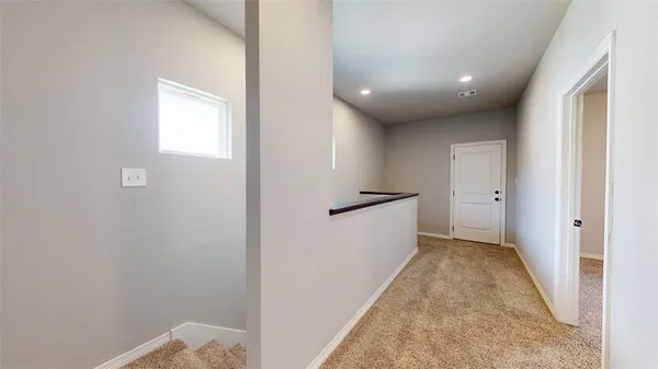 a view of hallway with window