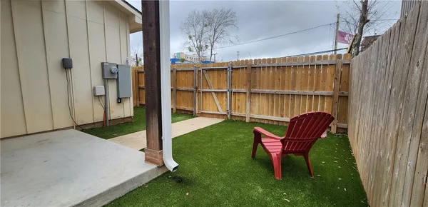 a view of backyard with cabin