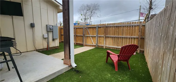 a view of backyard with cabin