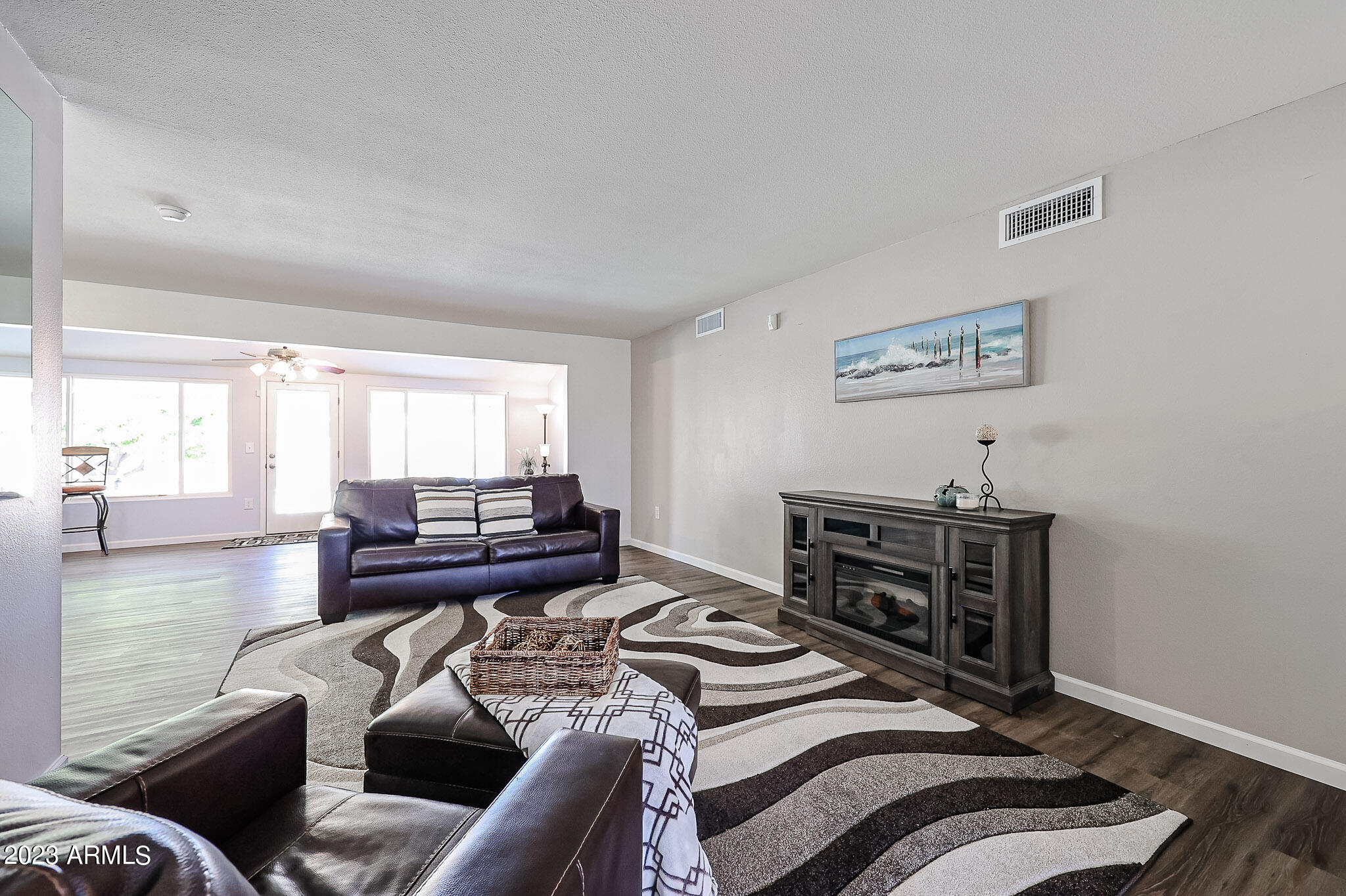 10838 West White Mountain Road Sun City, AZ 85351 - Photo 6 of 34 Great room 1