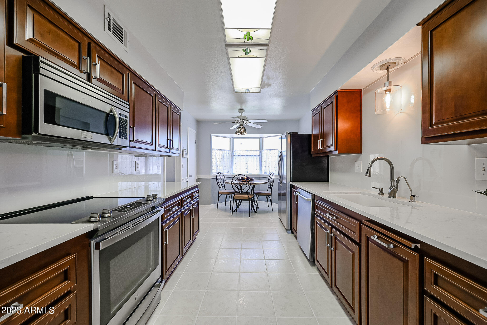 10838 West White Mountain Road Sun City, AZ 85351 - Photo 10 of 34 Kitchen 1