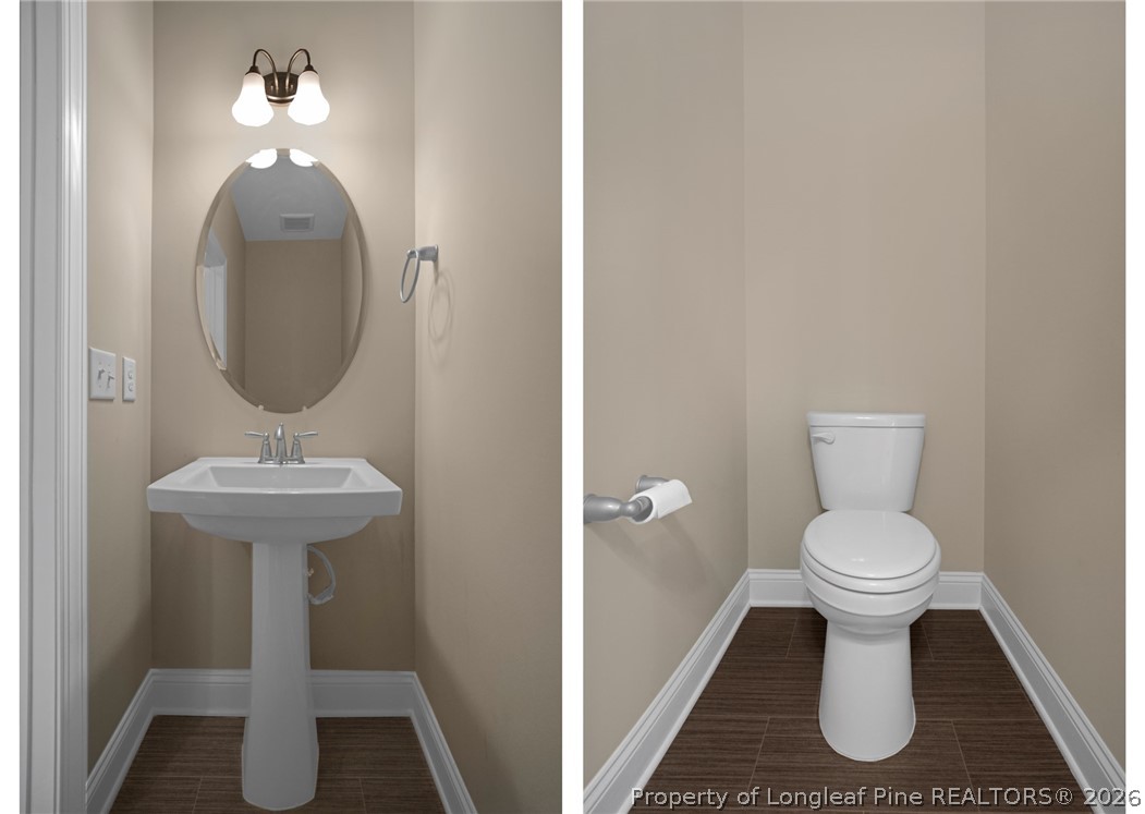 44 Princelet Point Cameron, NC 28326 - Photo 13 of 42 a bathroom with a toilet sink and mirror