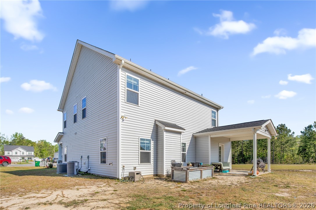 44 Princelet Point Cameron, NC 28326 - Photo 29 of 42 a view of a house with a patio