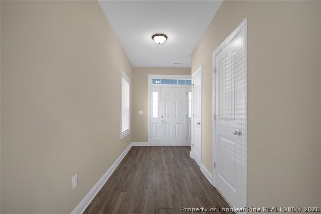 44 Princelet Point Cameron, NC 28326 - Photo 6 of 42 a view of a hallway with wooden floor
