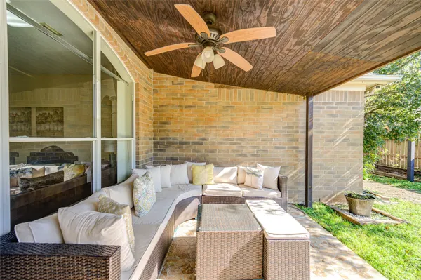 a view of balcony with furniture