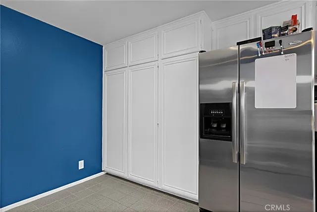 a kitchen with a refrigerator