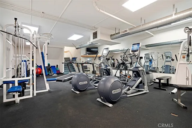 a view of a room with gym equipment